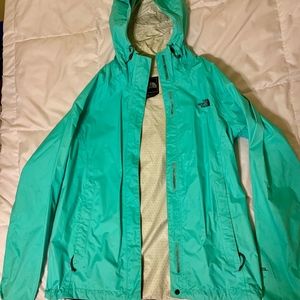 Light blue North Face raincoat
